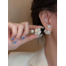 Aretes con perla artificial y flor