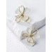 Aretes de flor blanca con dorado