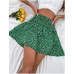 Falda verde fruncida con estampado floral