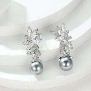 Aretes largos con diseño de circón y perla artificial