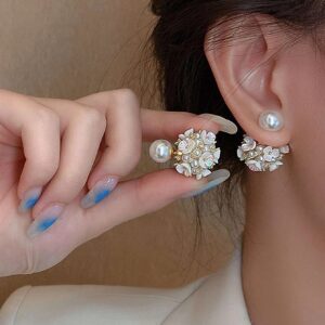Aretes con perla artificial y flor